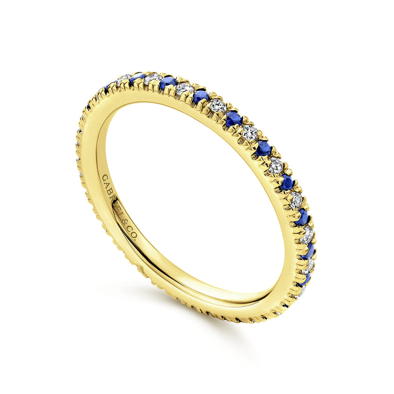 Eternity Band Wedding Ring in 14k Yellow Gold with Round Sapphire at Gabriel & Co. - Shot 3