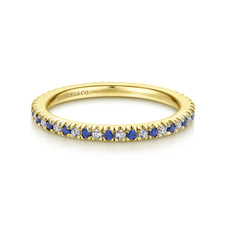 Eternity Band Wedding Ring in 14k Yellow Gold with Round Sapphire at Gabriel & Co. - Shot 1