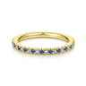 Eternity Band Wedding Ring in 14k Yellow Gold with Round Sapphire at Gabriel & Co.