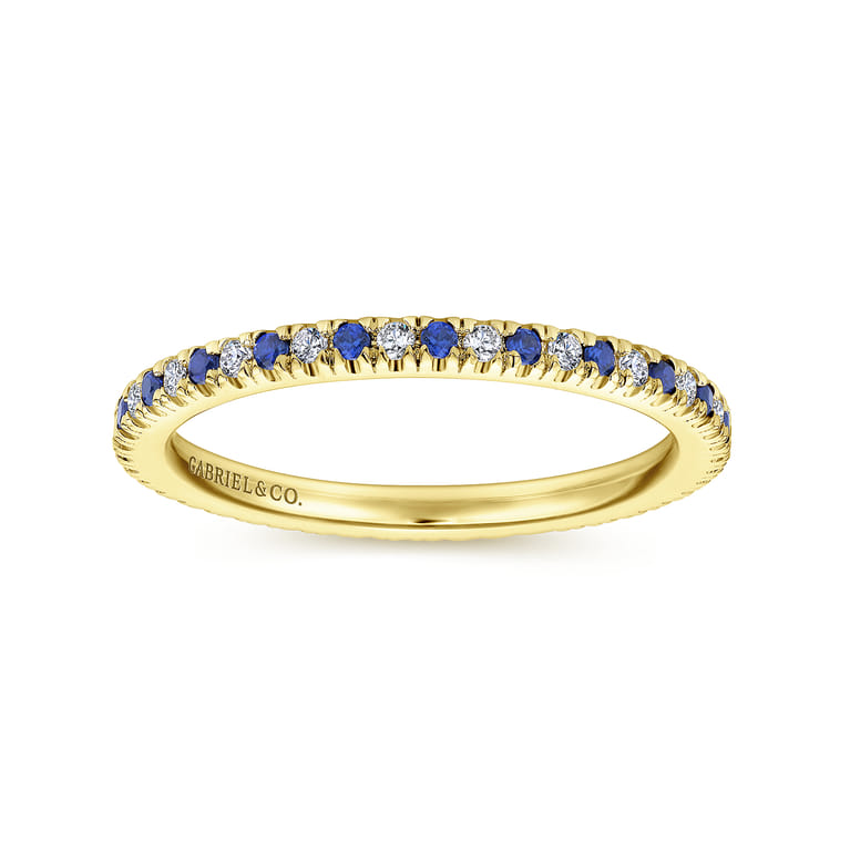 Eternity Band Wedding Ring in 14k Yellow Gold with Round Sapphire at Gabriel & Co. - Shot 4