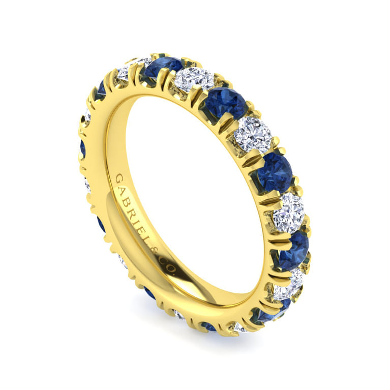 Eternity Band Wedding Ring in 14k Yellow Gold with Round Sapphire at Gabriel & Co. - Shot 3