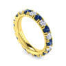 Eternity Band Wedding Ring in 14k Yellow Gold with Round Sapphire at Gabriel & Co.