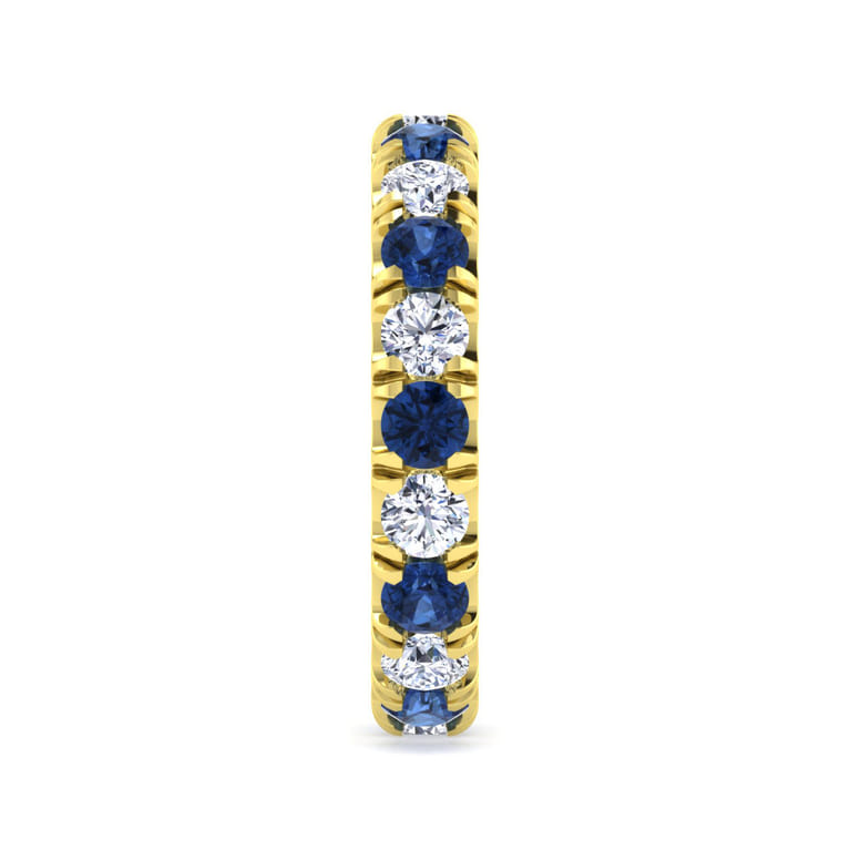 Eternity Band Wedding Ring in 14k Yellow Gold with Round Sapphire at Gabriel & Co. - Shot 4