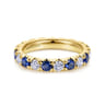 Eternity Band Wedding Ring in 14k Yellow Gold with Round Sapphire at Gabriel & Co.