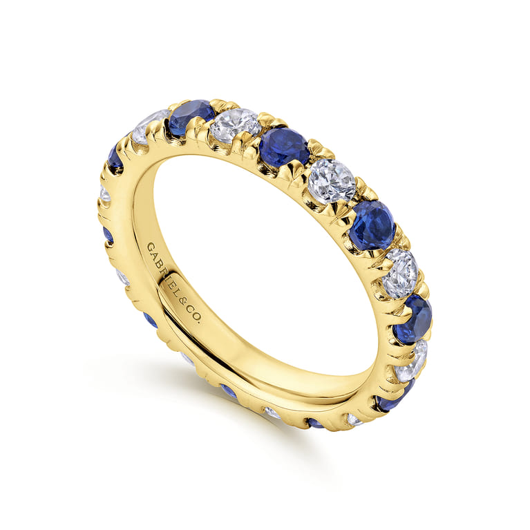 Eternity Band Wedding Ring in 14k Yellow Gold with Round Sapphire at Gabriel & Co. - Shot 3
