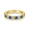 Eternity Band Wedding Ring in 14k Yellow Gold with Round Sapphire at Gabriel & Co.