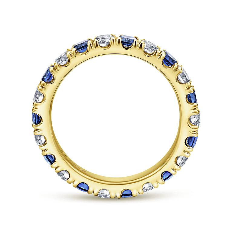 Eternity Band Wedding Ring in 14k Yellow Gold with Round Sapphire at Gabriel & Co. - Shot 2