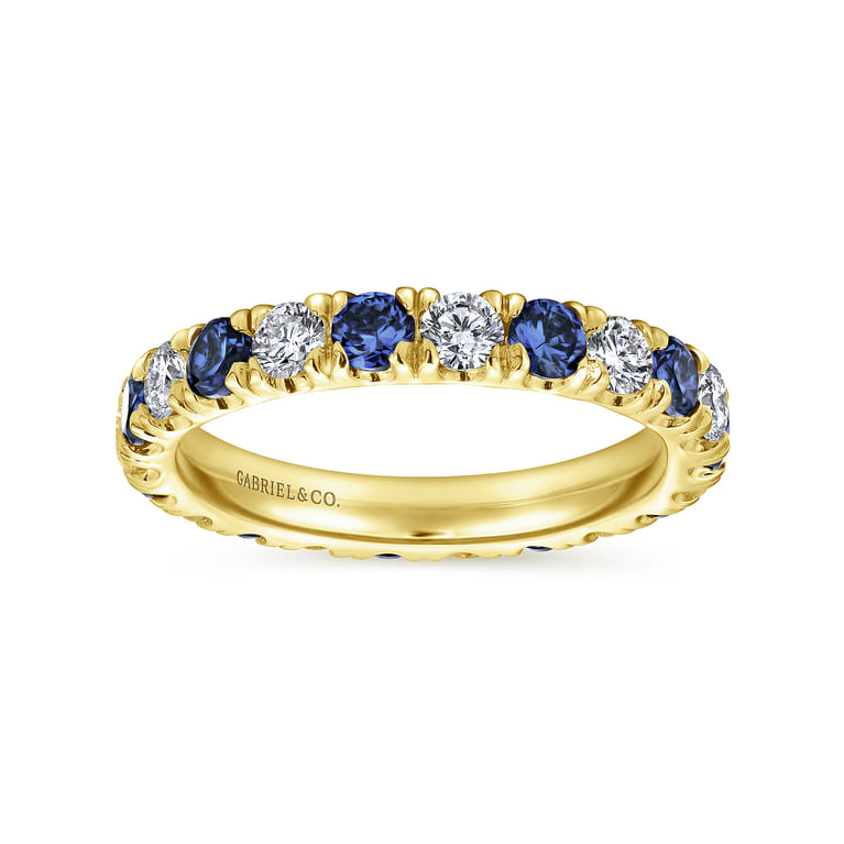 Eternity Band Wedding Ring in 14k Yellow Gold with Round Sapphire at Gabriel & Co. - Shot 4