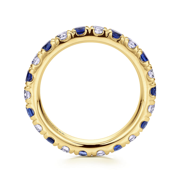 Eternity Band Wedding Ring in 14k Yellow Gold with Round Sapphire at Gabriel & Co. - Shot 2