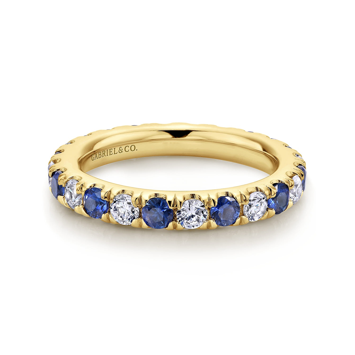 Eternity Band Wedding Ring in 14k Yellow Gold with Round Sapphire at Gabriel & Co. - Shot 1