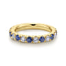 Eternity Band Wedding Ring in 14k Yellow Gold with Round Sapphire at Gabriel & Co.