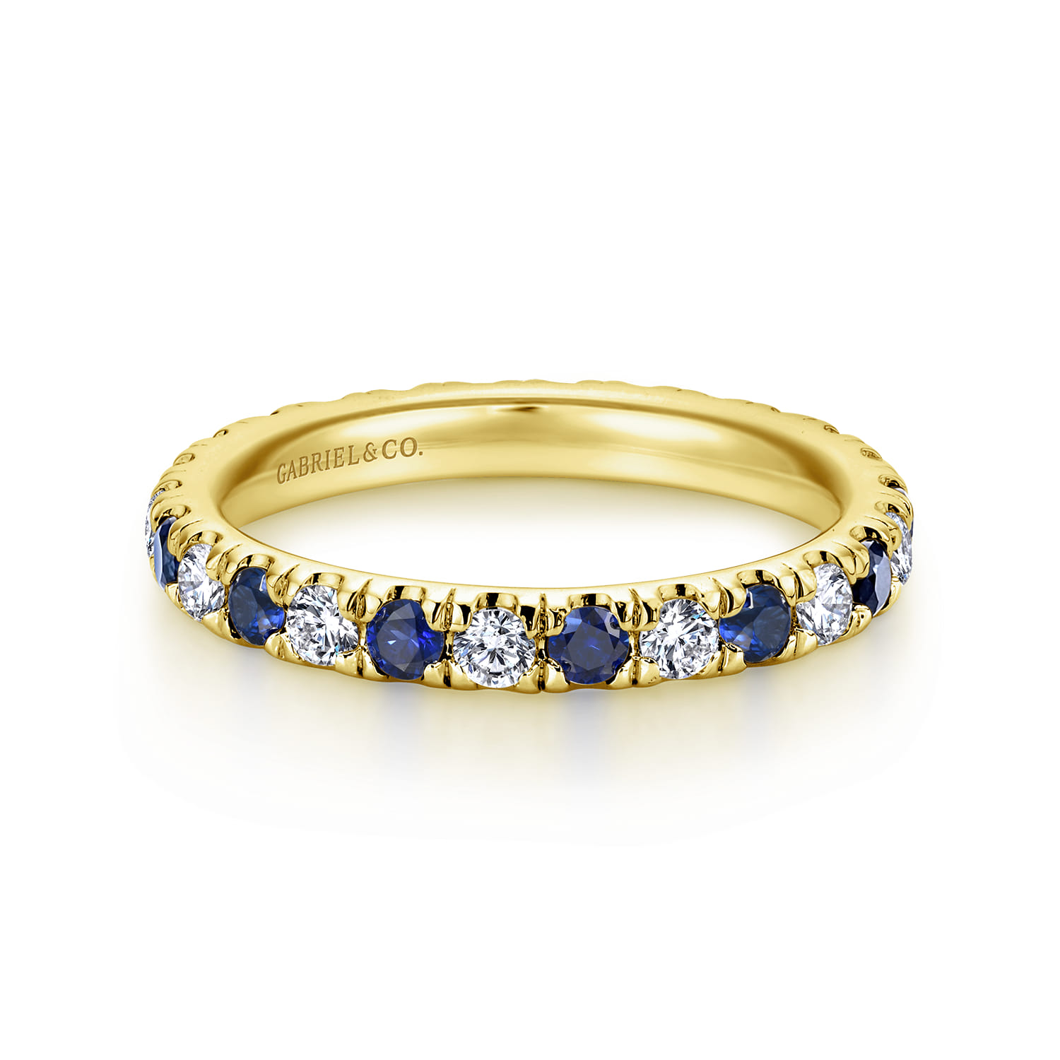 Eternity Band Wedding Ring in 14k Yellow Gold with Round Sapphire at Gabriel & Co. - Shot 1
