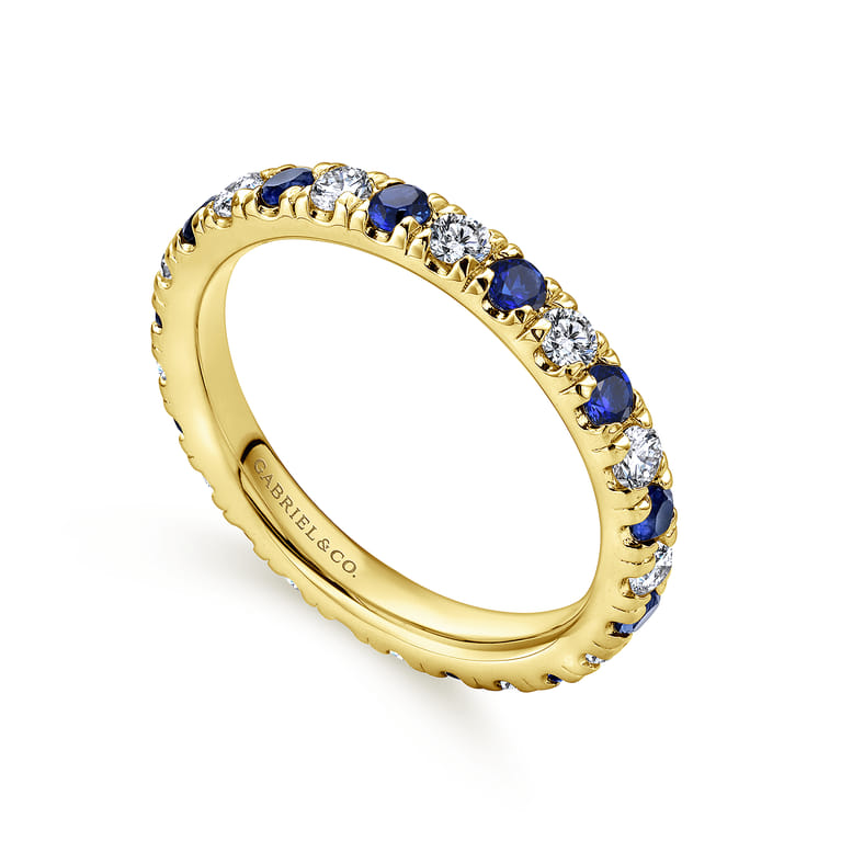 Eternity Band Wedding Ring in 14k Yellow Gold with Round Sapphire at Gabriel & Co. - Shot 3