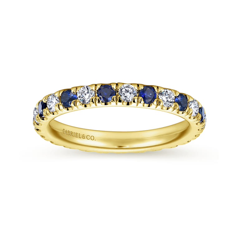 Eternity Band Wedding Ring in 14k Yellow Gold with Round Sapphire at Gabriel & Co. - Shot 4