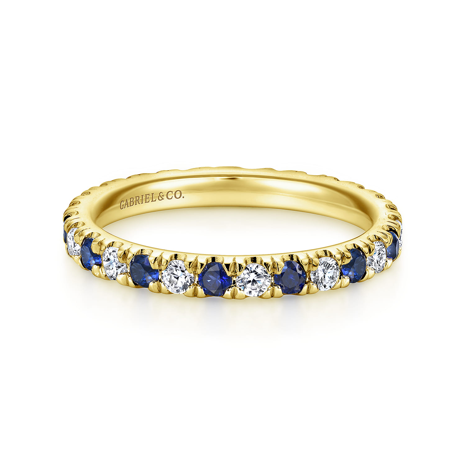 Eternity Band Wedding Ring in 14k Yellow Gold with Round Sapphire at Gabriel & Co. - Shot 1
