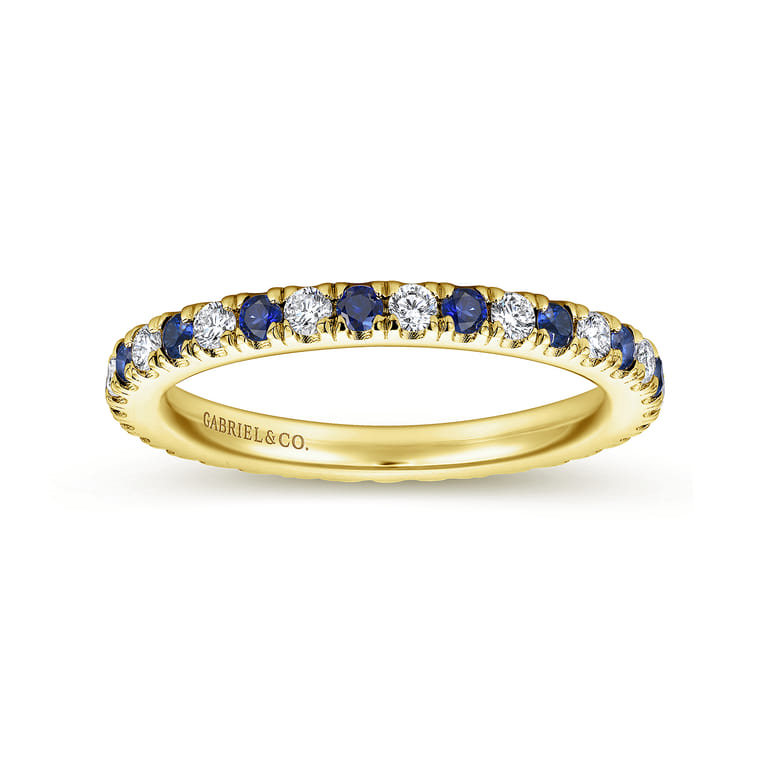 Eternity Band Wedding Ring in 14k Yellow Gold with Round Sapphire at Gabriel & Co. - Shot 4