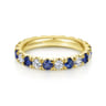 Eternity Band Wedding Ring in 14k Yellow Gold with Round Sapphire at Gabriel & Co.