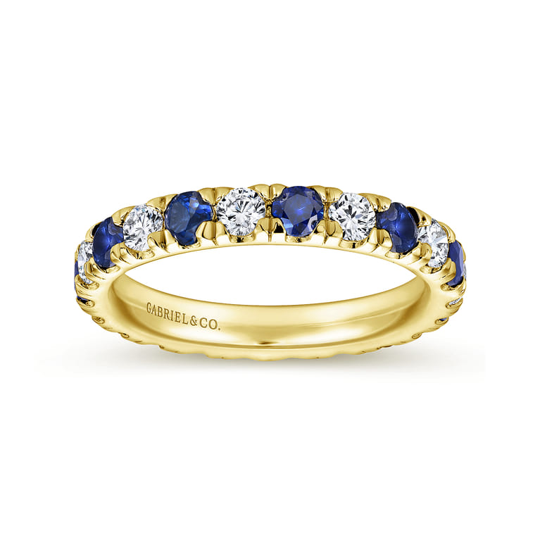 Eternity Band Wedding Ring in 14k Yellow Gold with Round Sapphire at Gabriel & Co. - Shot 4