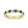 Eternity Band Wedding Ring in 14k Yellow Gold with Round Sapphire at Gabriel & Co.