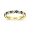 Eternity Band Wedding Ring in 14k Yellow Gold with Round Sapphire at Gabriel & Co.