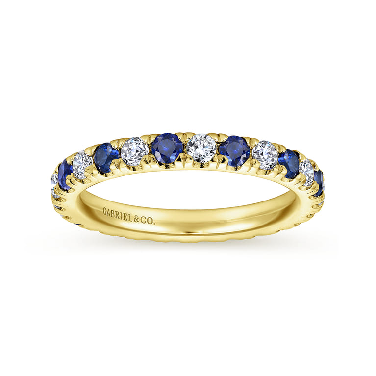 Eternity Band Wedding Ring in 14k Yellow Gold with Round Sapphire at Gabriel & Co. - Shot 4