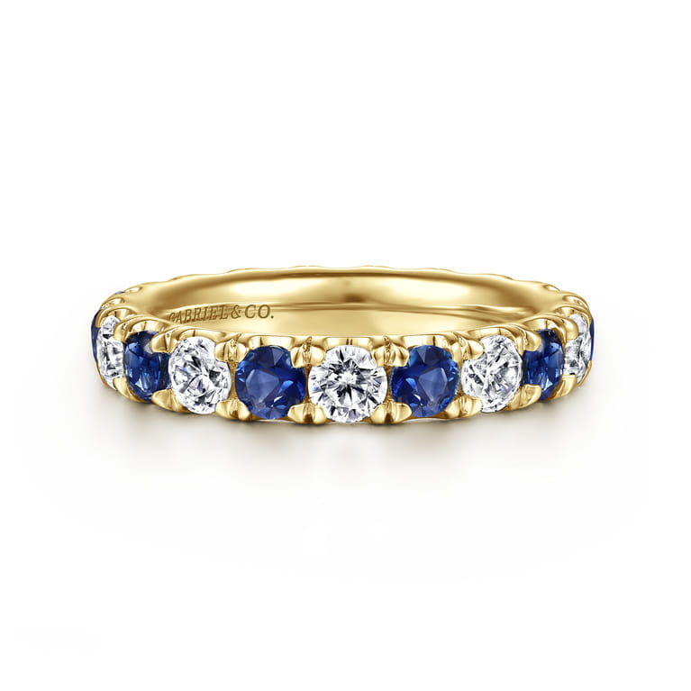 Eternity Band Wedding Ring in 14k Yellow Gold with Round Sapphire at Gabriel & Co. - Shot 1