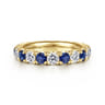 Eternity Band Wedding Ring in 14k Yellow Gold with Round Sapphire at Gabriel & Co.