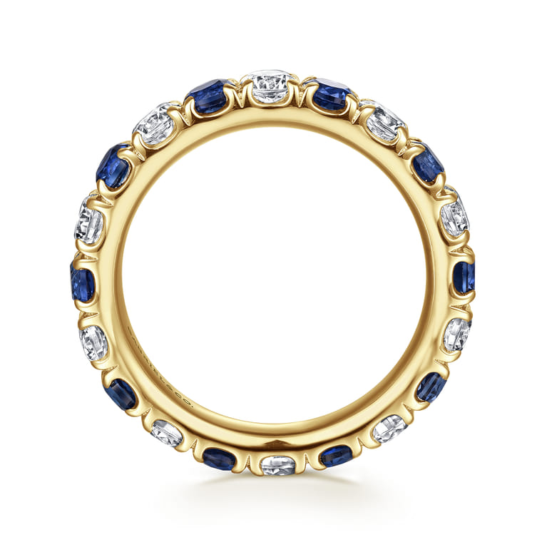 Eternity Band Wedding Ring in 14k Yellow Gold with Round Sapphire at Gabriel & Co. - Shot 2