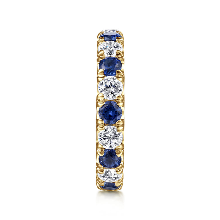 Eternity Band Wedding Ring in 14k Yellow Gold with Round Sapphire at Gabriel & Co. - Shot 4