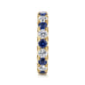 Eternity Band Wedding Ring in 14k Yellow Gold with Round Sapphire at Gabriel & Co.