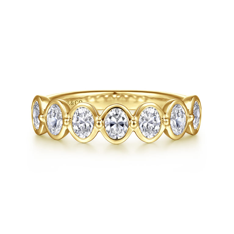 Straight Wedding Ring in 14k Yellow Gold with Oval Natural Diamond at Gabriel & Co. - Shot 1