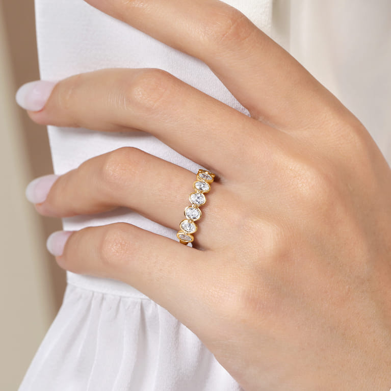 Straight Wedding Ring in 14k Yellow Gold with Oval Natural Diamond at Gabriel & Co. - Shot 5