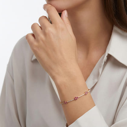 Demure - 14K Yellow Gold Bangle with Diamond and Ruby Quatrefoil Stations