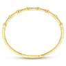 Demure - 14K Yellow Gold Bezel Station Diamond Bangle - 0.55 ct