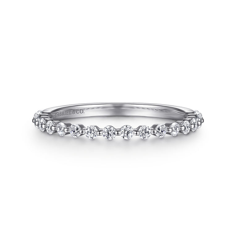 Straight Wedding Ring in Platinum with Round Natural Diamond at Gabriel & Co. - Shot 1