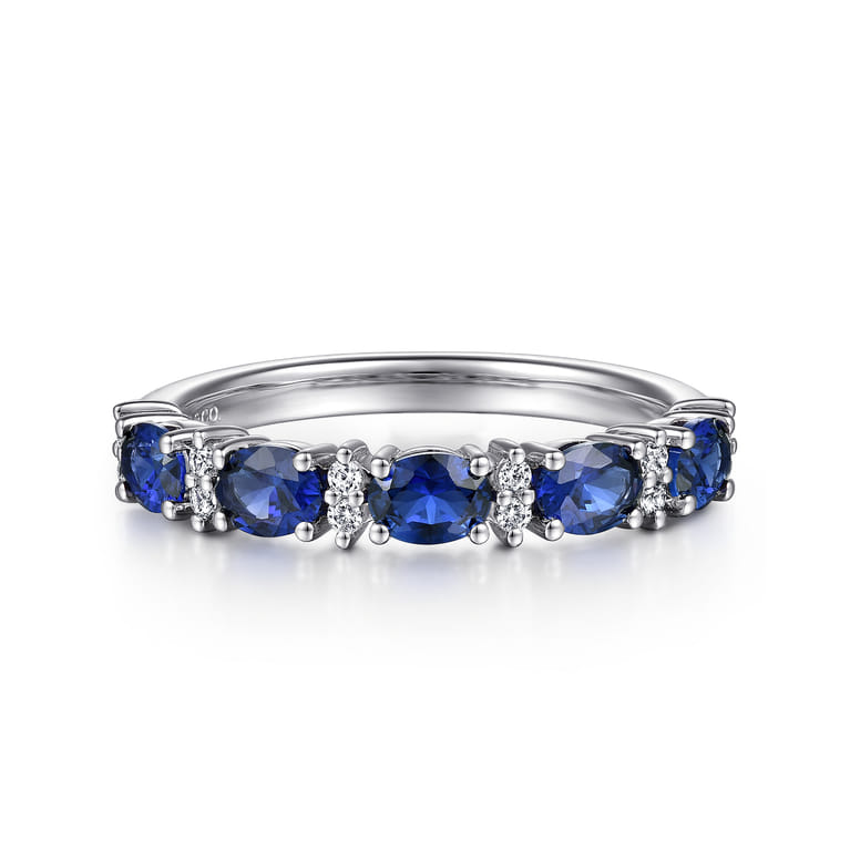 Fancy Wedding Ring in Platinum with Oval Sapphire at Gabriel & Co. - Shot 1