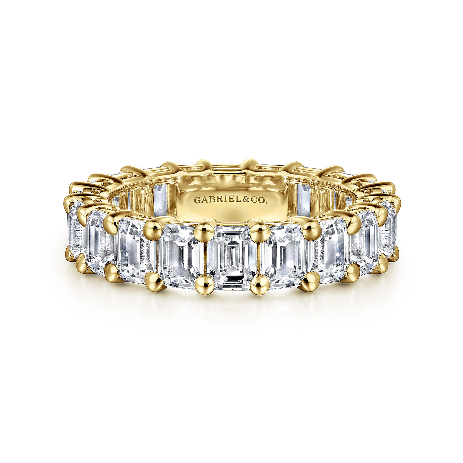 Eternity Band Wedding Ring in 14k Yellow Gold with Emerald Cut Natural Diamond at Gabriel & Co. - Shot 1