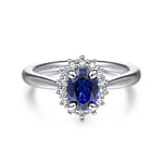 Fergie---14K-White-Gold-Oval-Halo-Sapphire-and-Diamond-Engagement-Ring1