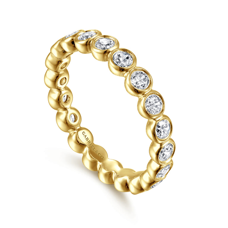 Eternity Band Wedding Ring in 14k Yellow Gold with Round Natural Diamond at Gabriel & Co. - Shot 3