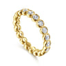 Eternity Band Wedding Ring in 14k Yellow Gold with Round Natural Diamond at Gabriel & Co.