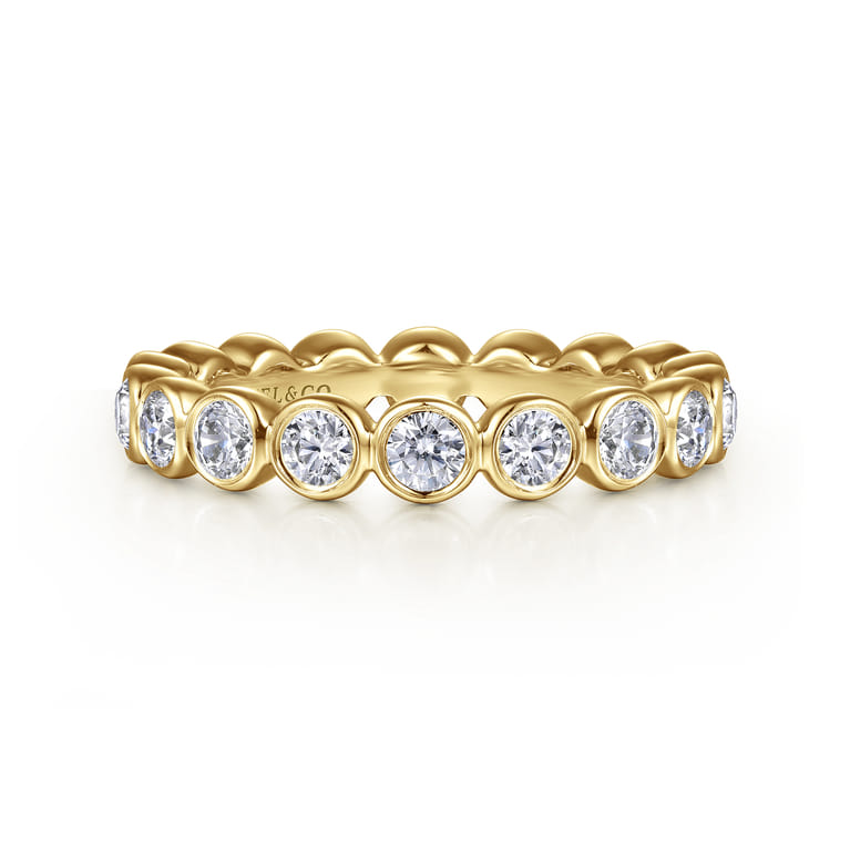 Eternity Band Wedding Ring in 14k Yellow Gold with Round Natural Diamond at Gabriel & Co. - Shot 1