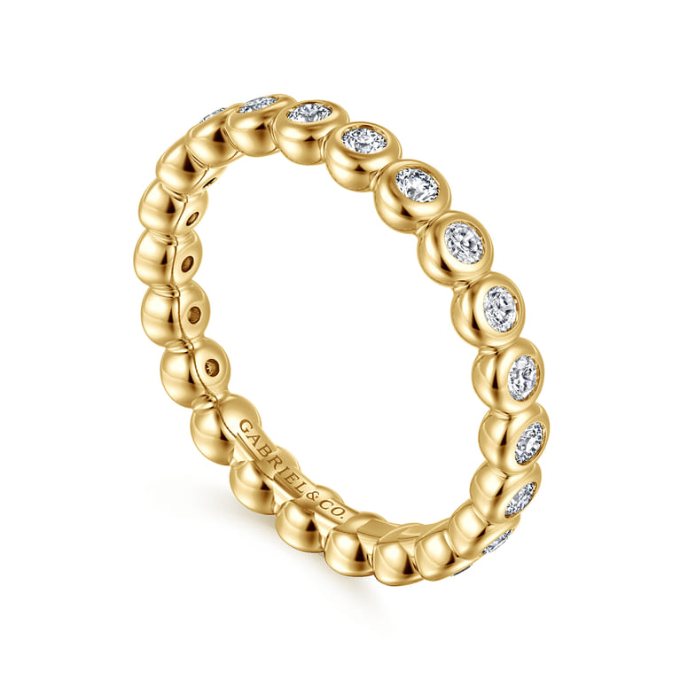 Eternity Band Wedding Ring in 14k Yellow Gold with Round Natural Diamond at Gabriel & Co. - Shot 3