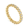 Eternity Band Wedding Ring in 14k Yellow Gold with Round Natural Diamond at Gabriel & Co.