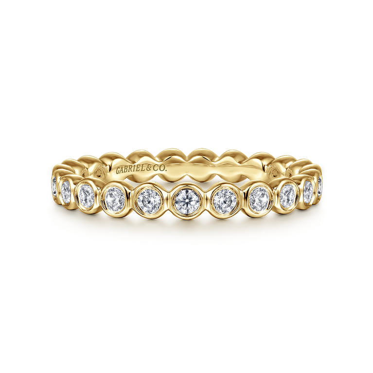 Eternity Band Wedding Ring in 14k Yellow Gold with Round Natural Diamond at Gabriel & Co. - Shot 1