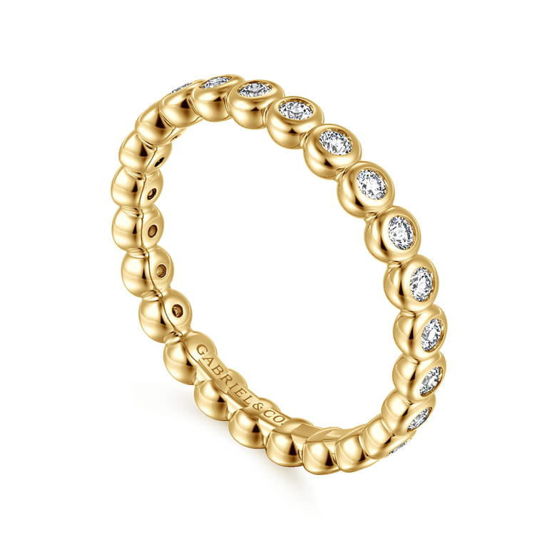 Eternity Band Wedding Ring in 14k Yellow Gold with Round Natural Diamond at Gabriel & Co. - Shot 3