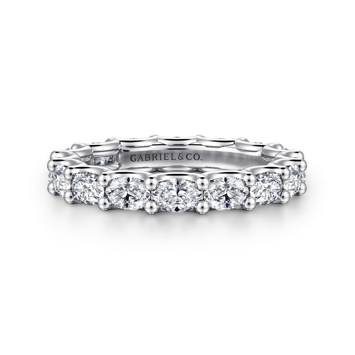 Eternity Band Wedding Ring in 14k White Gold with Oval Natural Diamond at Gabriel & Co. - Shot 1