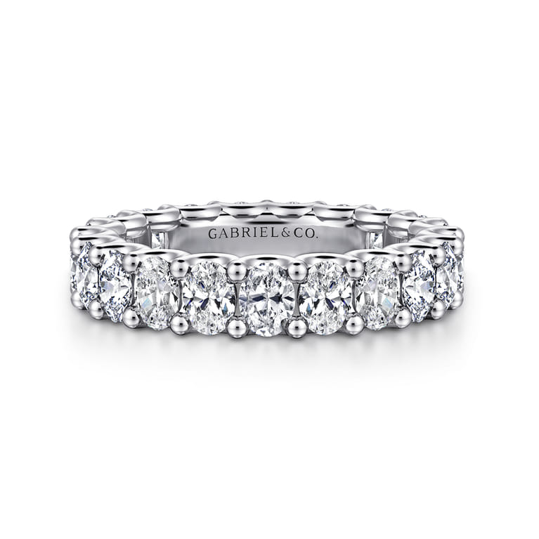 Eternity Band Wedding Ring in 14k White Gold with Oval Natural Diamond at Gabriel & Co. - Shot 1