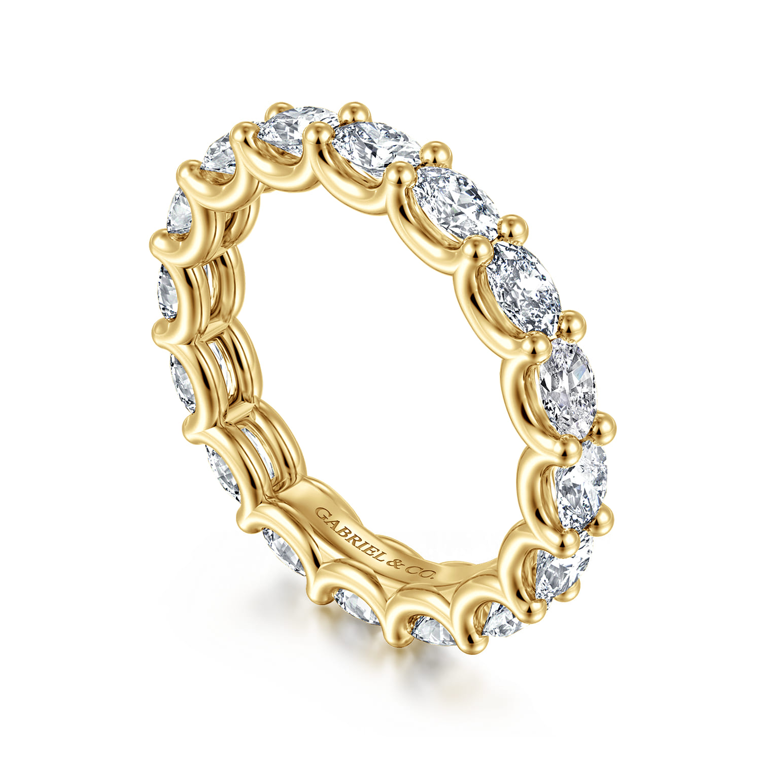 Eternity Band Wedding Ring in 14k Yellow Gold with Oval Natural Diamond at Gabriel & Co. - Shot 3