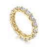 Eternity Band Wedding Ring in 14k Yellow Gold with Oval Natural Diamond at Gabriel & Co.