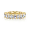 Eternity Band Wedding Ring in 14k Yellow Gold with Oval Natural Diamond at Gabriel & Co.